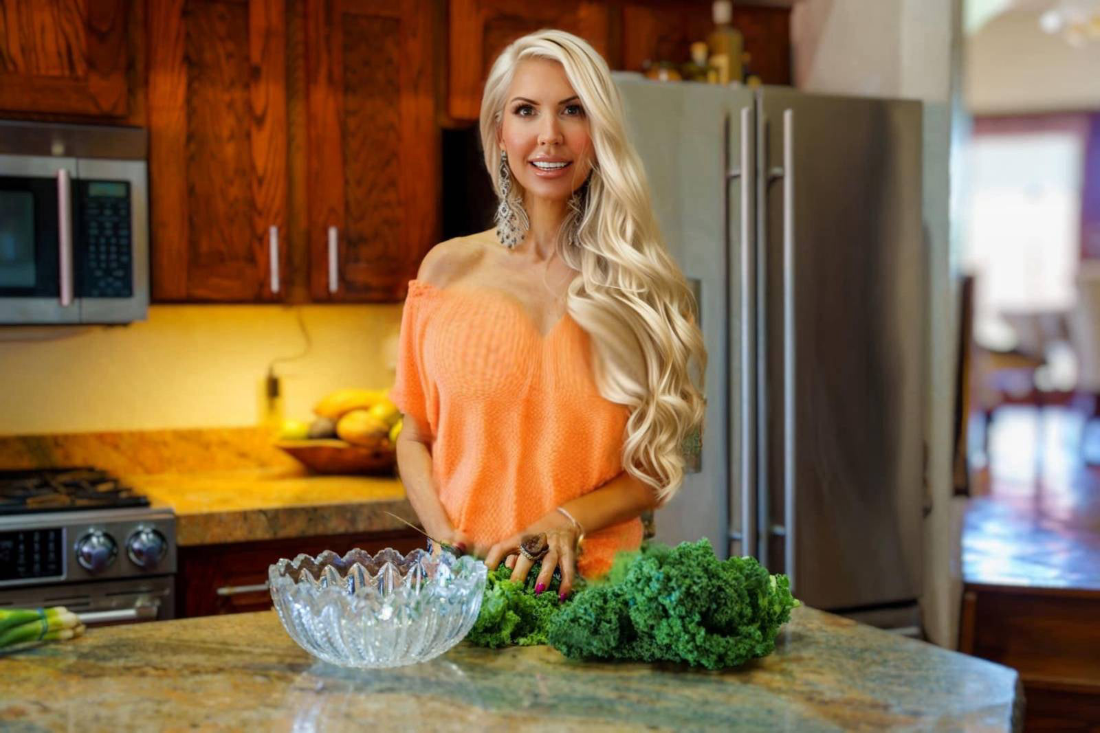Andrea smiling in her kitchen