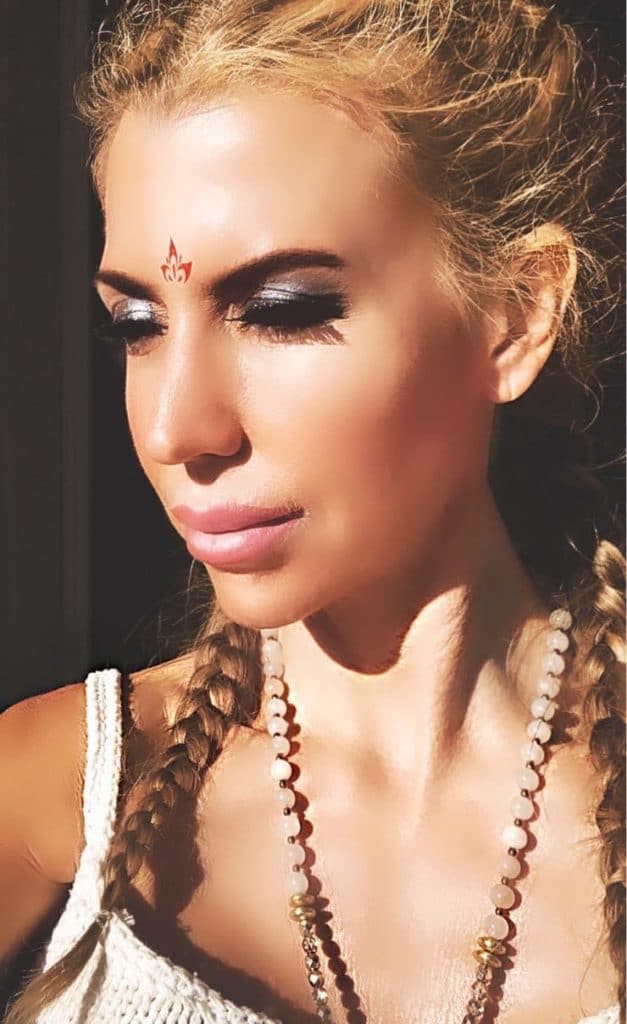 Andrea Cox wearing bindi and beads